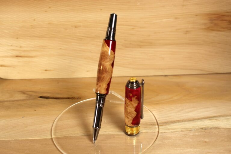 Broadwell Art Deco rollerball pen in black TN and 22kt gold with maple burl.